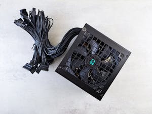 Computer power supply unit with several cables.