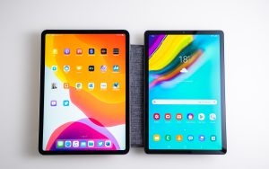 Two modern tablets on a desk.